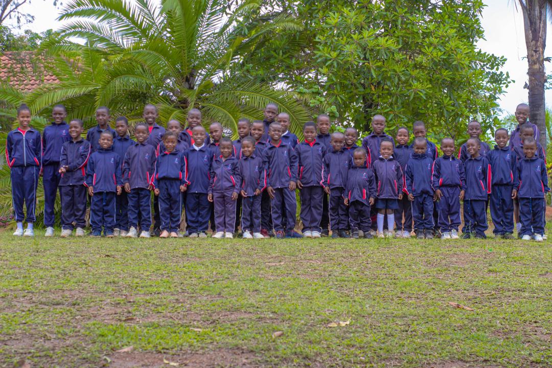 Bethel College learners standing together in school tracksuits